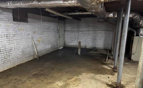 Badly damaged and damp basement