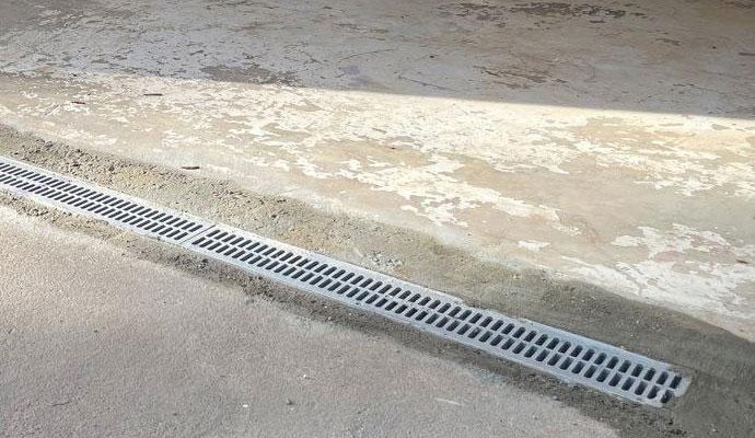 Installed surface drain system